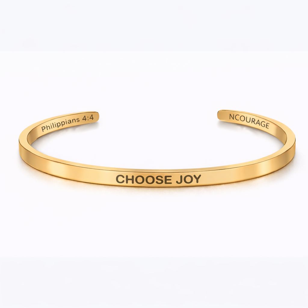 Gold bracelet with 'Choose Joy' engraving on a white background