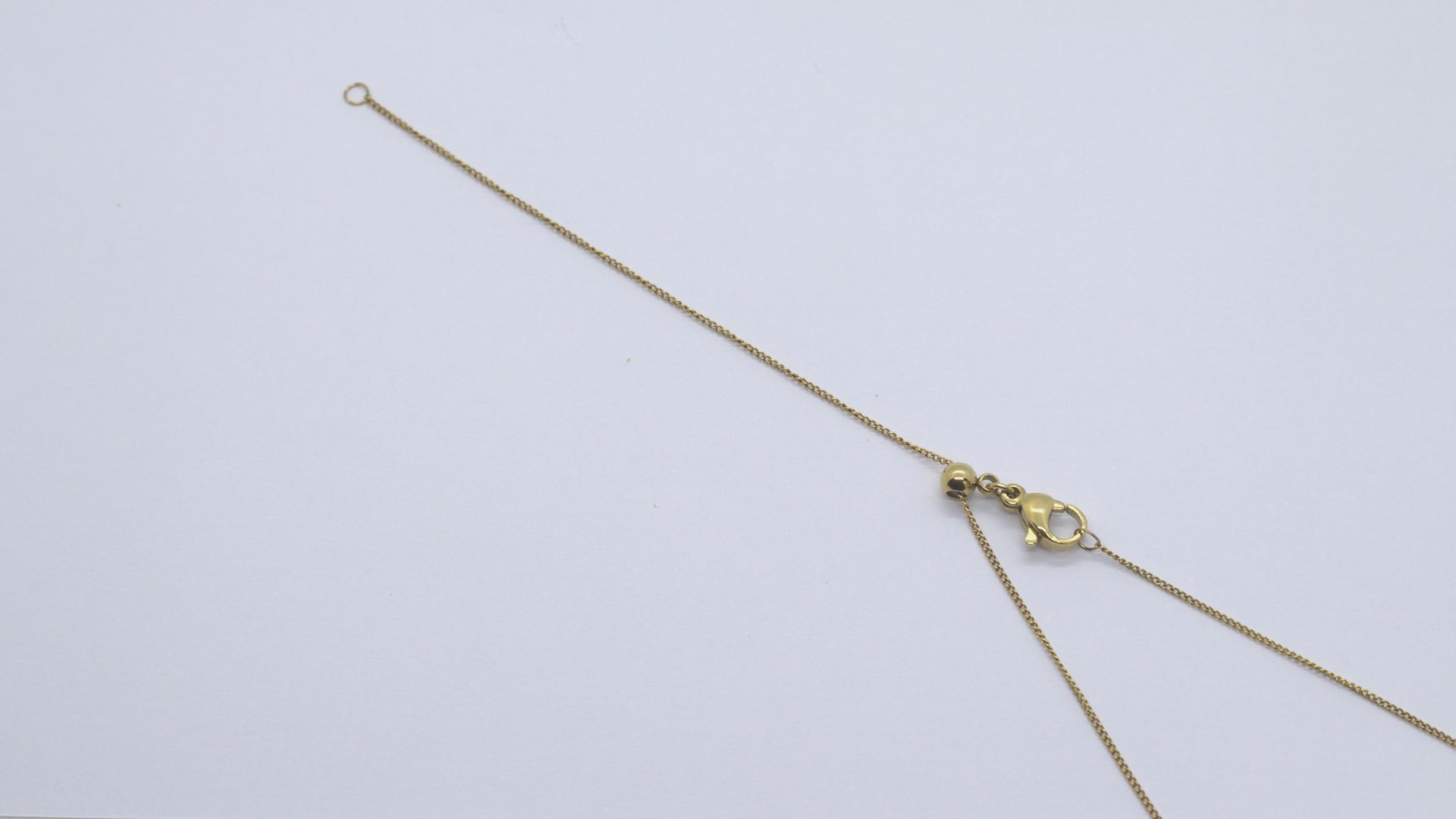 Video Showing Dainty Cable Necklace clasp adjustability